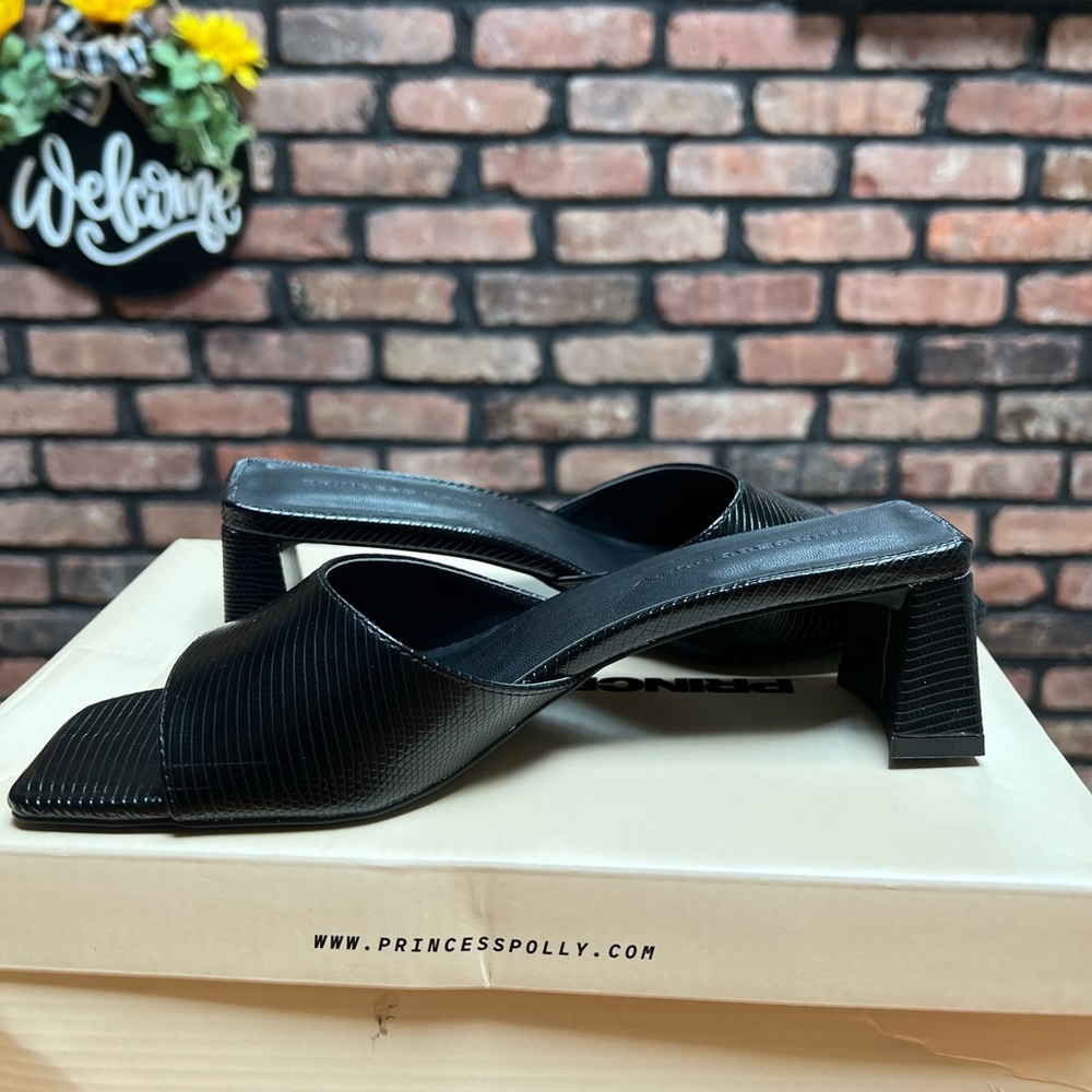 Black low heel slip on sandals